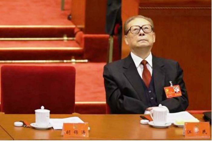 China's former President Jiang Zemin looks up while President Hu Jintao gives his speech during the opening ceremony of 18th National Congress of the Communist Party of China at the Great Hall of the People in Beijing, November 8, 2012.
Credit: Reuters/Jason Lee